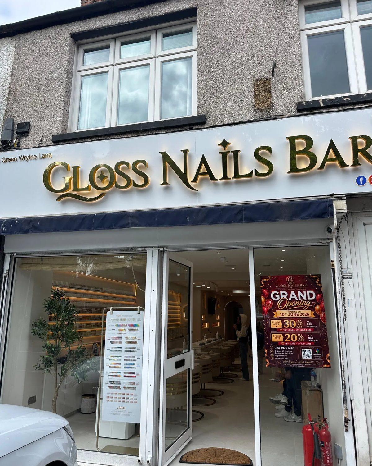 The Gloss Nails Bar shopfront on Green Wrythe Lane, gold lettering above a navy awning