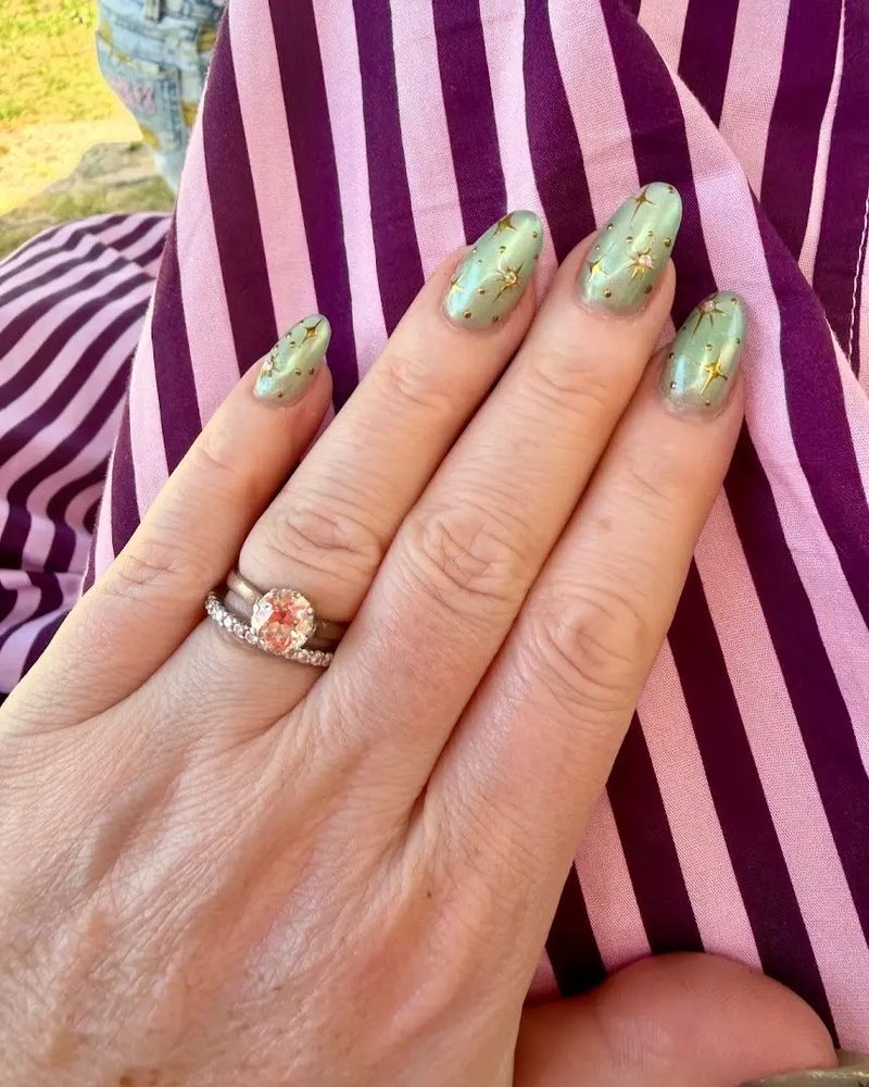 Sage green nails with gold marbled foil detail